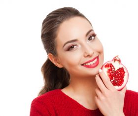 Stock Photo Woman holding pomegranate 01