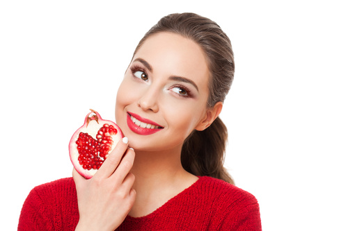 Stock Photo Woman holding pomegranate 02