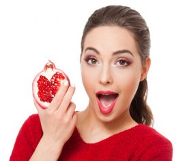 Stock Photo Woman holding pomegranate 03