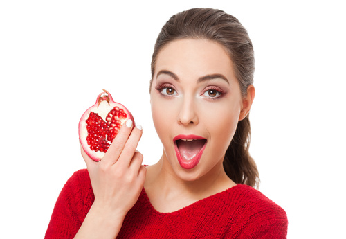 Stock Photo Woman holding pomegranate 03
