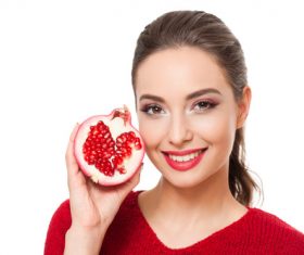 Stock Photo Woman holding pomegranate 04