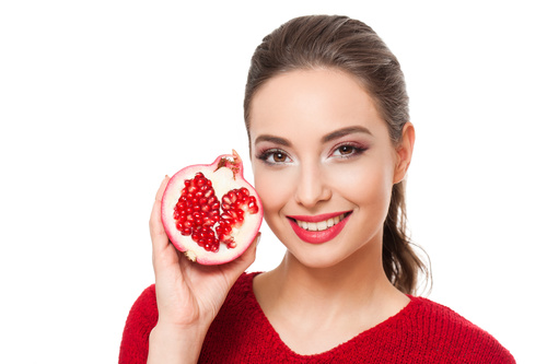 Stock Photo Woman holding pomegranate 04