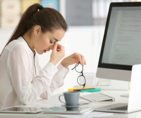 Stock Photo Young female programmer working in the office 06