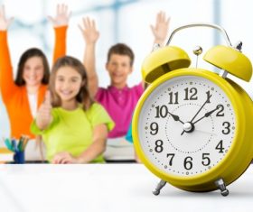 Student and alarm clock Stock Photo