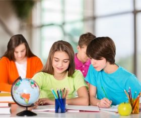 Students learn from each other in class Stock Photo