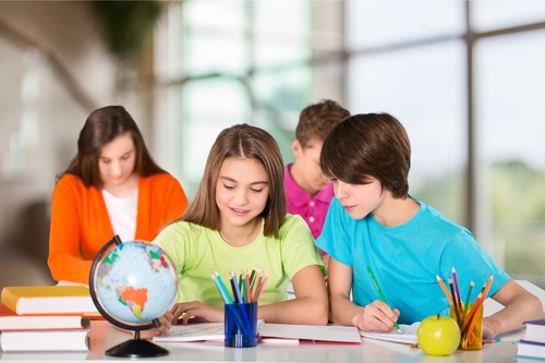 Students learn from each other in class Stock Photo