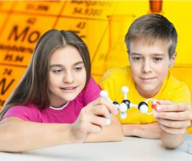 Two students holding chemical molecular model Stock Photo