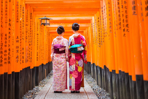 Two women wearing Japanese national costumes and kimonos Stock Photo