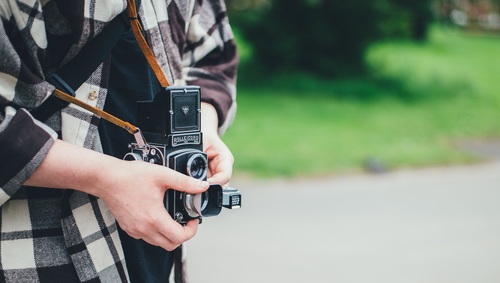 Use old fashioned camera to capture Stock Photo