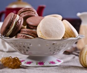 White Cream Macaroon and Chocolate Macaroon on the desktop Stock Photo 01