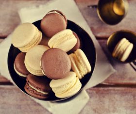 White Cream Macaroon and Chocolate Macaroon on the desktop Stock Photo 02