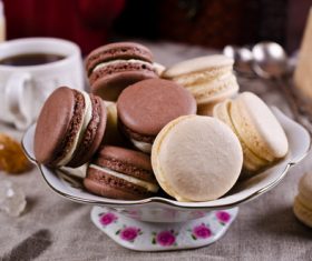 White Cream Macaroon and Chocolate Macaroon on the desktop Stock Photo 03