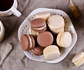 White Cream Macaroon and Chocolate Macaroon on the desktop Stock Photo 04