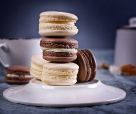 White Cream Macaroon and Chocolate Macaroon on the desktop Stock Photo 05