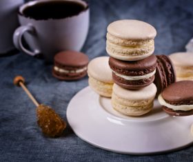 White Cream Macaroon and Chocolate Macaroon on the desktop Stock Photo 06