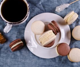 White Cream Macaroon and Chocolate Macaroon on the desktop Stock Photo 07