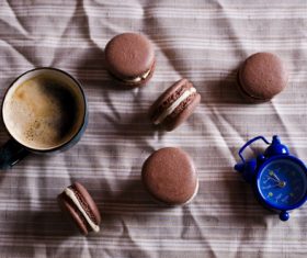 White Cream Macaroon and Coffee on the Desktop Stock Photo 03