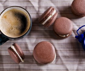 White Cream Macaroon and Coffee on the Desktop Stock Photo 04
