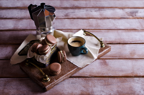 White Cream Macaroon and Coffee on the Desktop Stock Photo 05