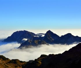 White cloud scape on high mountains Stock Photo
