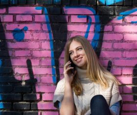 Woman answering the phone Stock Photo 01