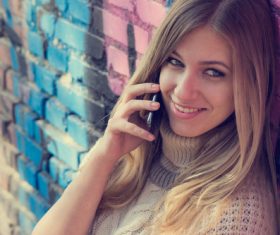 Woman answering the phone Stock Photo 03