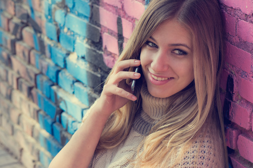 Woman answering the phone Stock Photo 03
