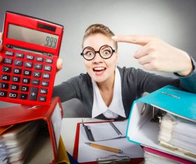 Woman holding calculator Stock Photo 02