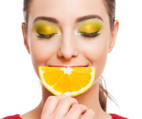 Woman holding fruit rich in vitamins Stock Photo 01