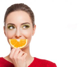 Woman holding fruit rich in vitamins Stock Photo 02