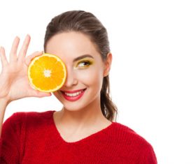 Woman holding fruit rich in vitamins Stock Photo 05