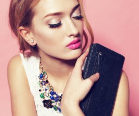 Woman holding wallet in hand Stock Photo