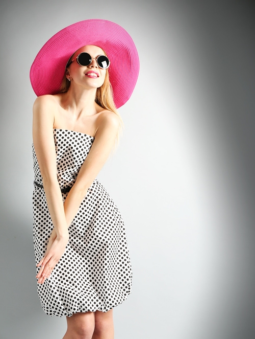 Woman wearing pink sunhat Stock Photo 04