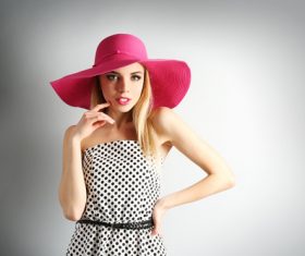 Woman wearing pink sunhat Stock Photo 05