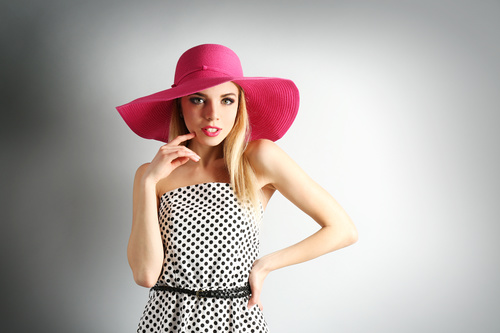 Woman wearing pink sunhat Stock Photo 05