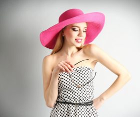 Woman wearing pink sunhat Stock Photo 06