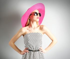 Woman wearing pink sunhat Stock Photo 07