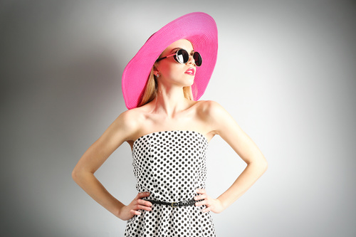 Woman wearing pink sunhat Stock Photo 07