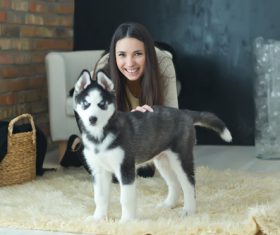 Woman with puppies husky Stock Photo 01