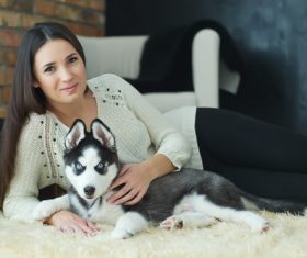 Woman with puppies husky Stock Photo 03