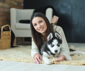 Woman with puppies husky Stock Photo 04