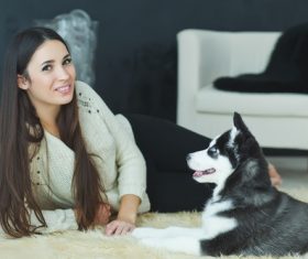 Woman with puppies husky Stock Photo 06
