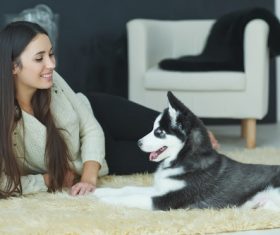 Woman with puppies husky Stock Photo 07