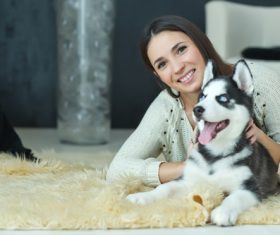 Woman with puppies husky Stock Photo 10