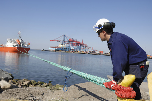 Worker detecting ship rope Stock Photo