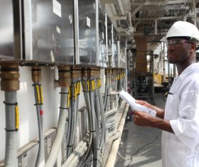 Worker with control equipment Stock Photo