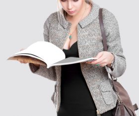 Young beautiful girl looking at documents Stock Photo