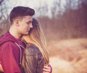 Young couple hugging together Stock Photo