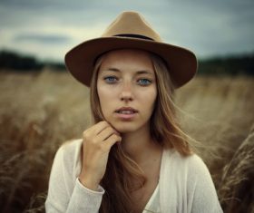 Young girl wearing hat outdoors Stock Photo