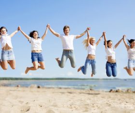 Young man jumping up Stock Photo